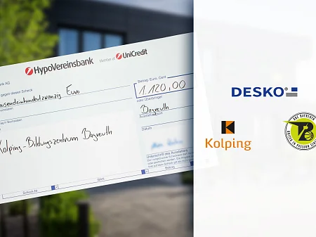 德国储蓄银行（HypoVereinsbank）为拜罗伊特科尔平教育中心（Kolping Education Centre Bayreuth）开具的1120欧元的象征性支票，旁边有DESKO和合作伙伴的标志。